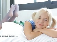 Ponytailed blondie stunner is smirking while waiting for her paramour to come and smash her brains out
