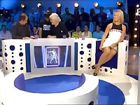Local celebrity panties close to skirt in a live show